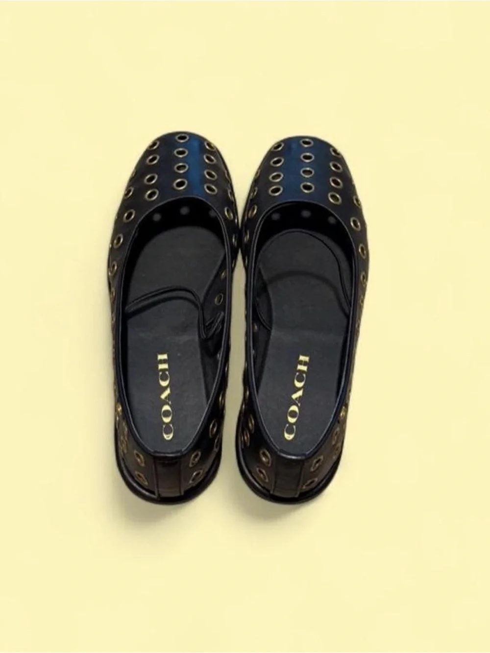 Coach Black Leather Ballet Flats with Gold Eyelets